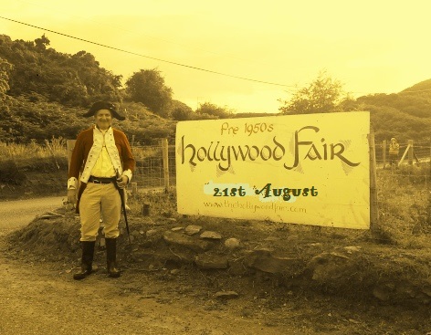 2015 Hollywood Fair sign and redcoat.