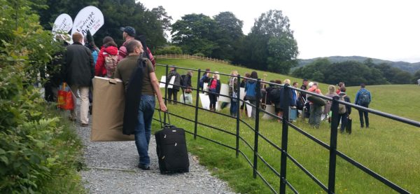 Wild card artists, each with their studio in tow, climb the hill to Wray Castle.