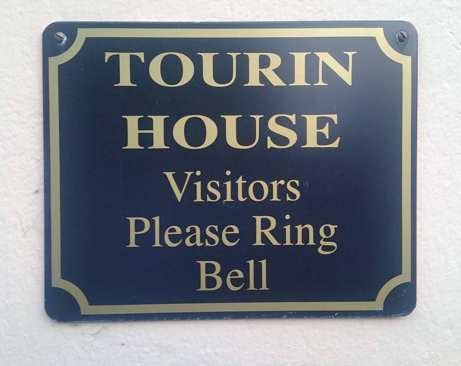 Tourin door sign.