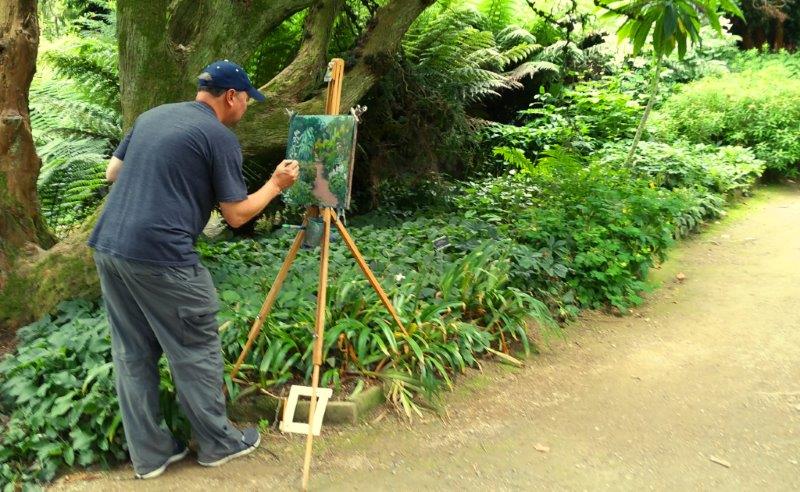 Student working at the Kilmacurragh Painting Workshop along the botanical borders.