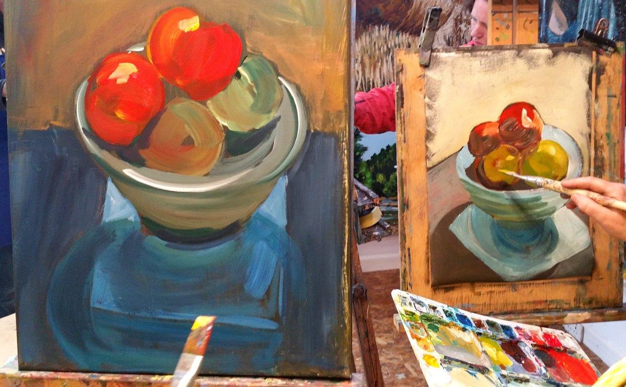 Two art students getting creative with apples. September Painting Course.