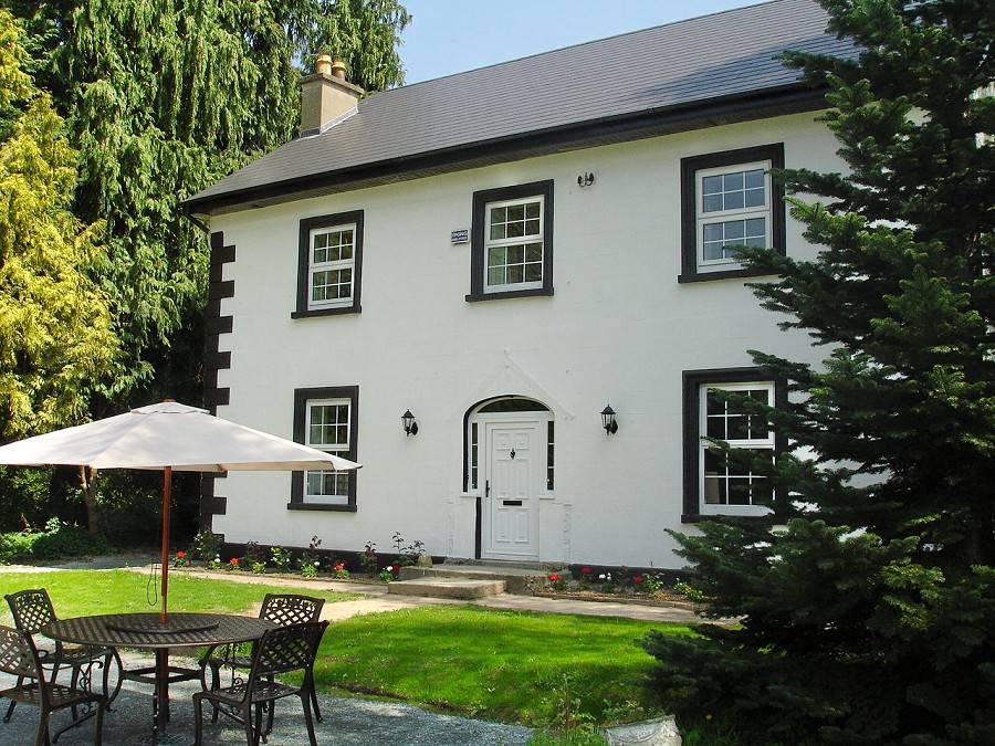 The Antique facade of Ashton House - book your own workshop accommodation.