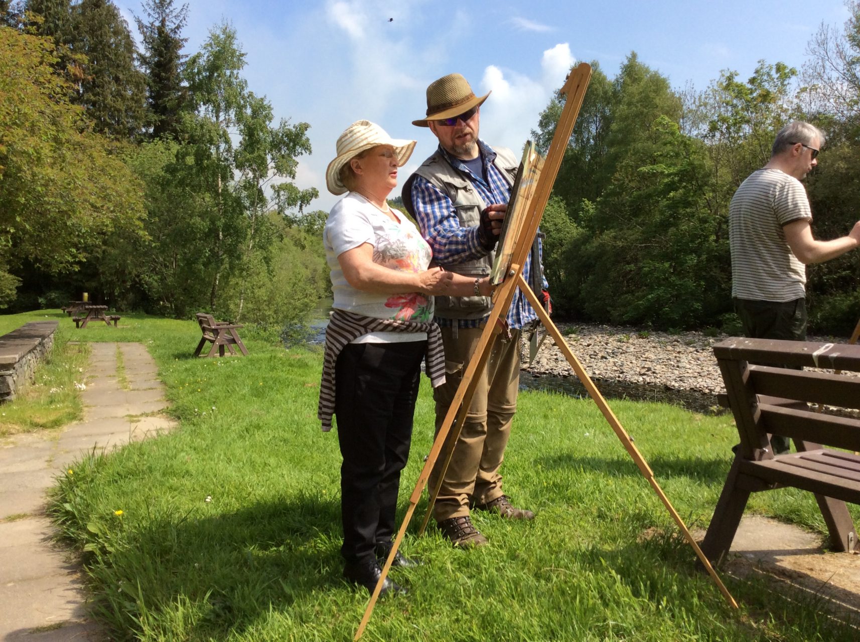 Rod Coyne explaining painting techniques for working outdoors.