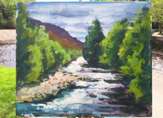 Rod Coyne's mornig painting demo rests on a easel in front of the Avoca River.