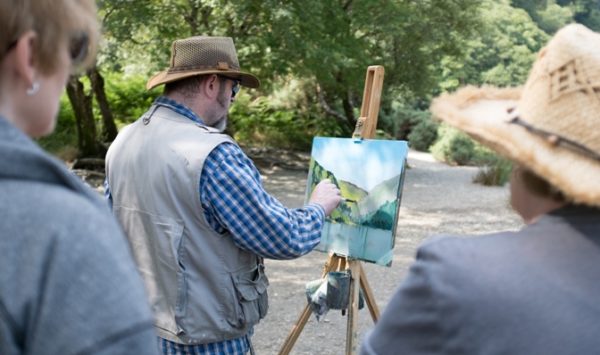 Workshop host, Rod Coyne, completes his painting demo for eager students. There is a magical air on Glendalough's upper lake, a jewel of ire land's ancient east.