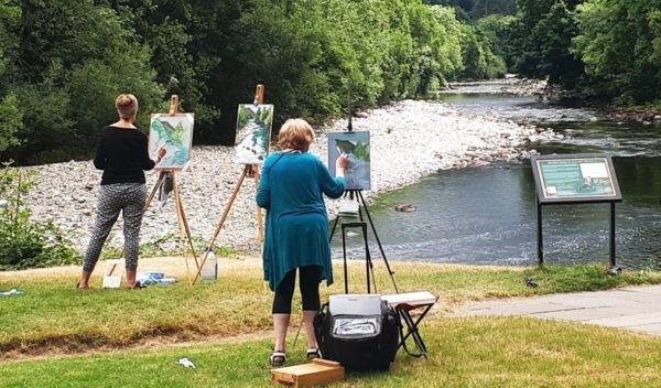 Students capture the river's light and movement with Rod Coyne at Meetings of the Waters.