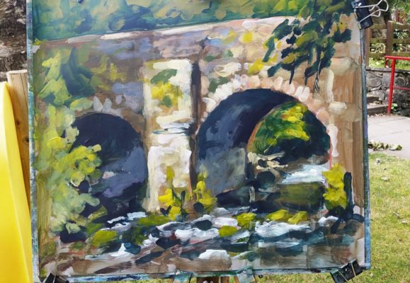 Rod Coyne's stone bridge painting demo at the Meeting of the Waters.