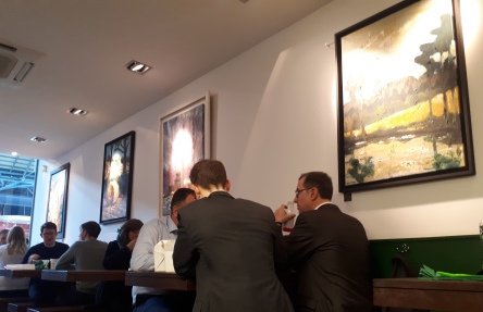 Photo of Diners from Dublin's Financial Centre surrounded by Rod Coyne's singular contemporary paintings.