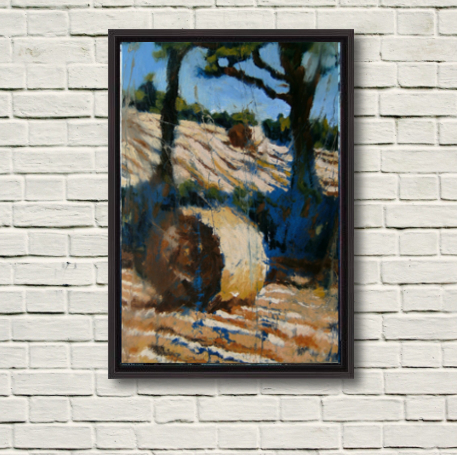 Photo of "Two Bales, Two Trees", canvas print in a black frame.