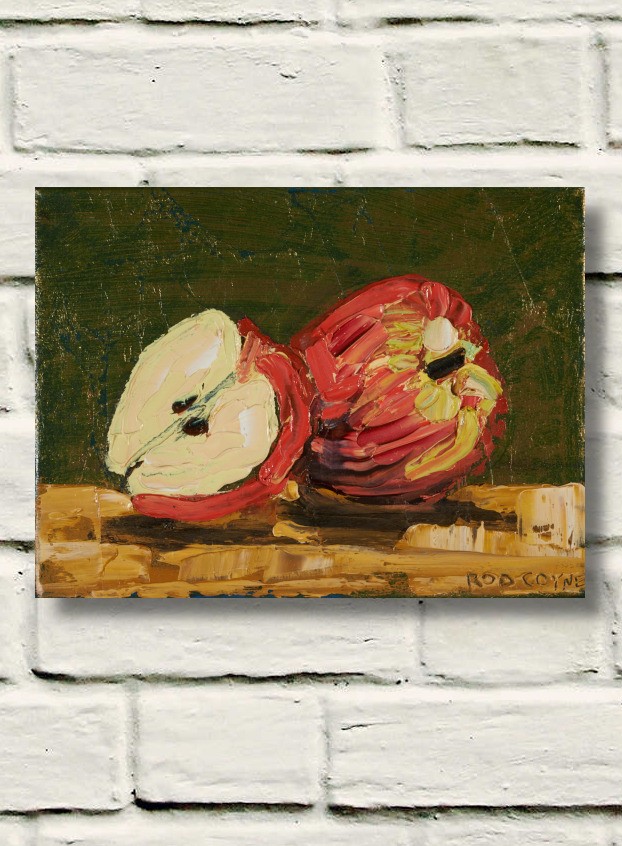 artist rod coyne's still life painting "apple still life" is shown here, unframed on a white brick wall.
