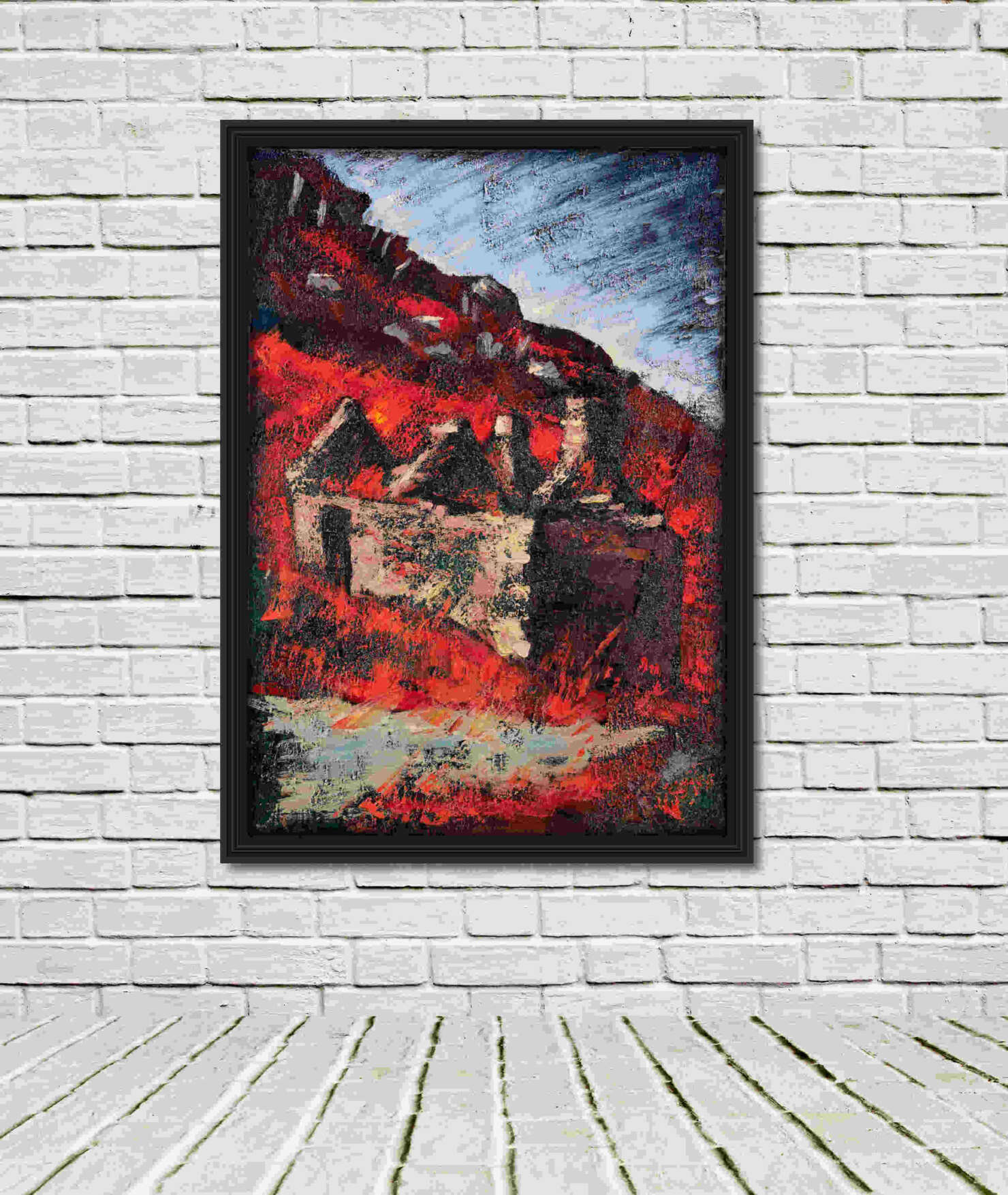 artist rod coyne's landscape "Famine Village Ruins, East" is shown here, in a black frame in a white room.