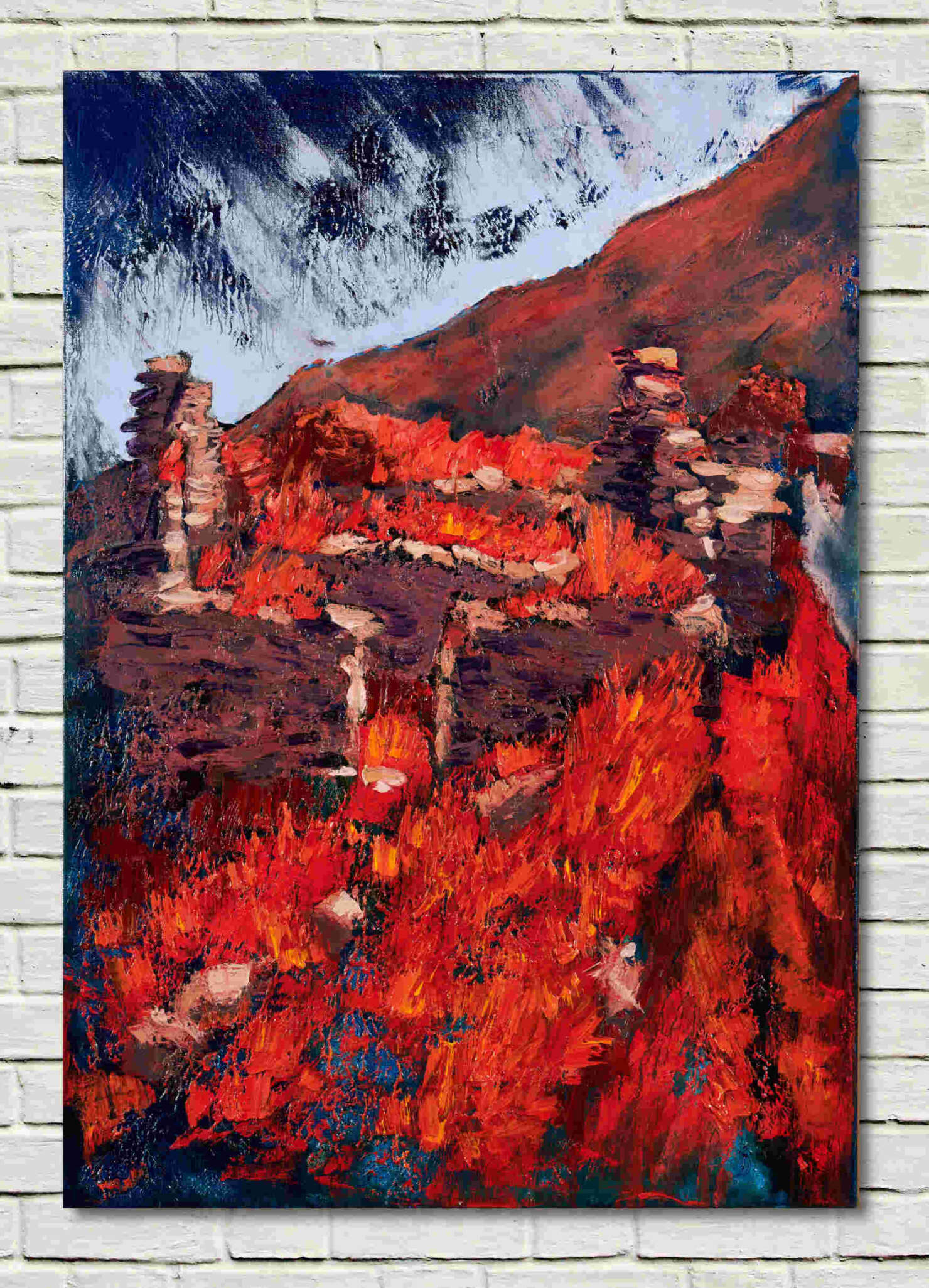 artist rod coyne's landscape "Famine Village Ruins West" is shown here, unframed on a white wall.