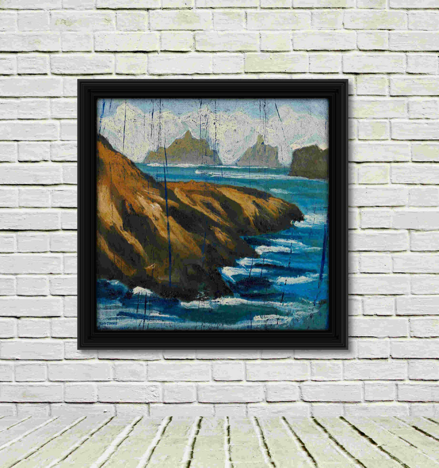 artist rod coyne's seascape "Kerry Islands" is shown here, in a black frame on a white wall.